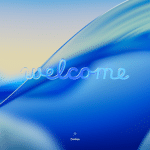 macOS Tahoe welcome screen with a blue wave background.