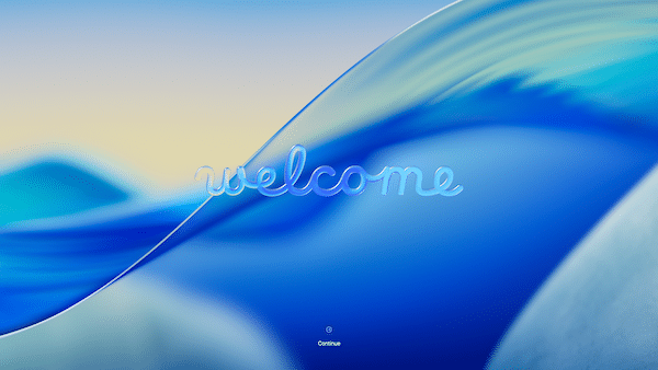 macOS Tahoe welcome screen with a blue wave background.